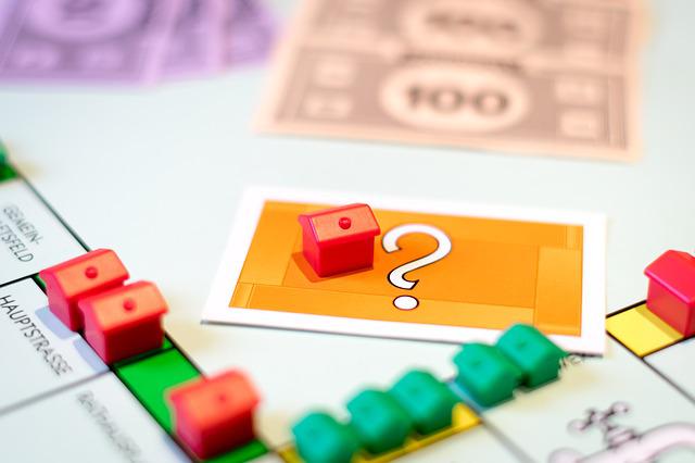 Photo shows monopoly houses and money